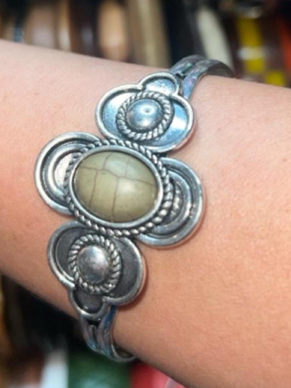 Y2K Silver tone cuff bracelet with olive green central oval stone